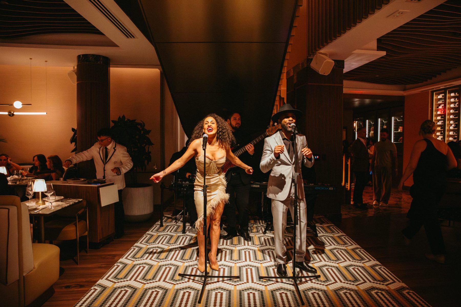 Live vocalists performing in the dining room