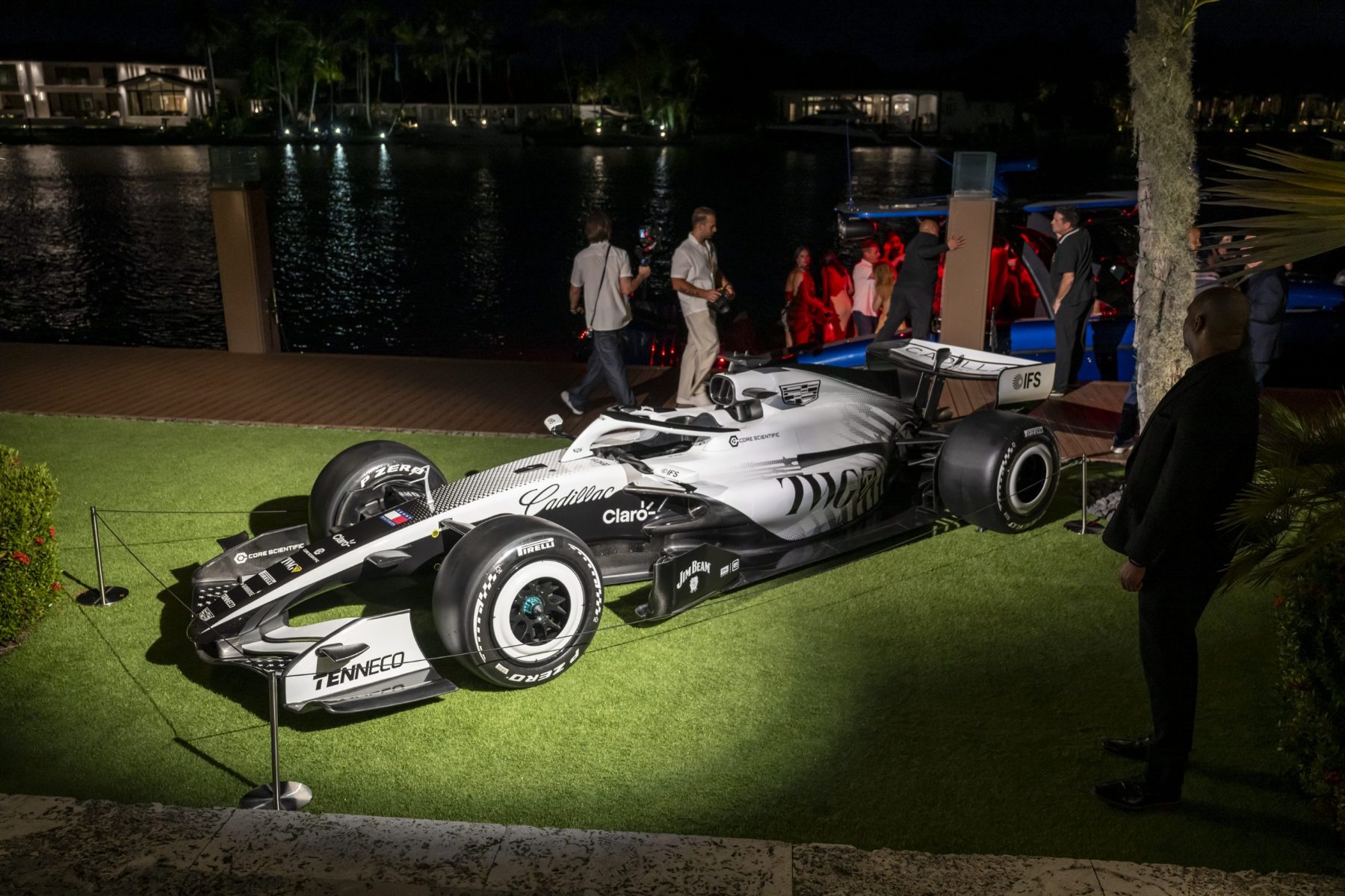 A Formula 1 car on the lawn at the Miami estate activation