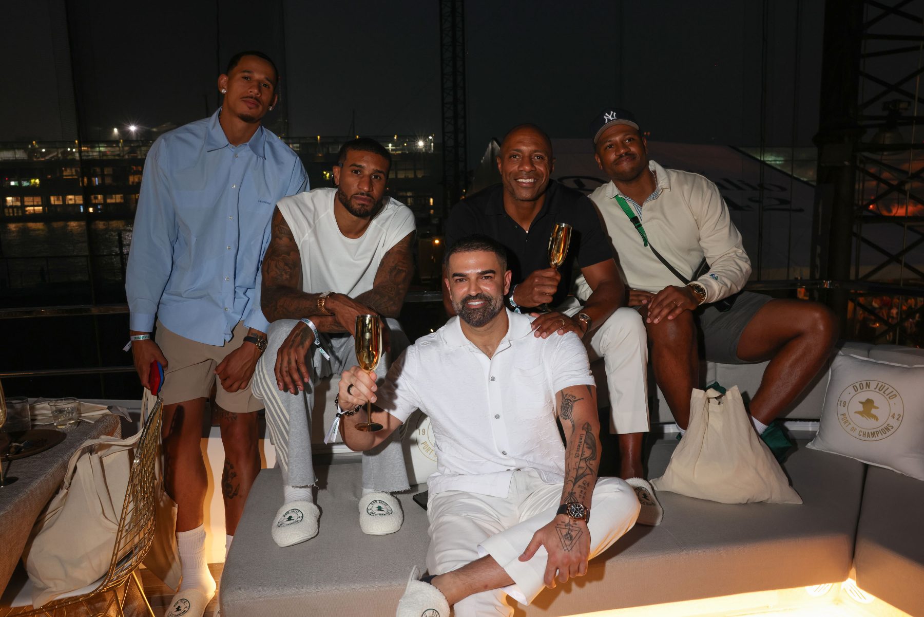 Guests raising a toast on deck