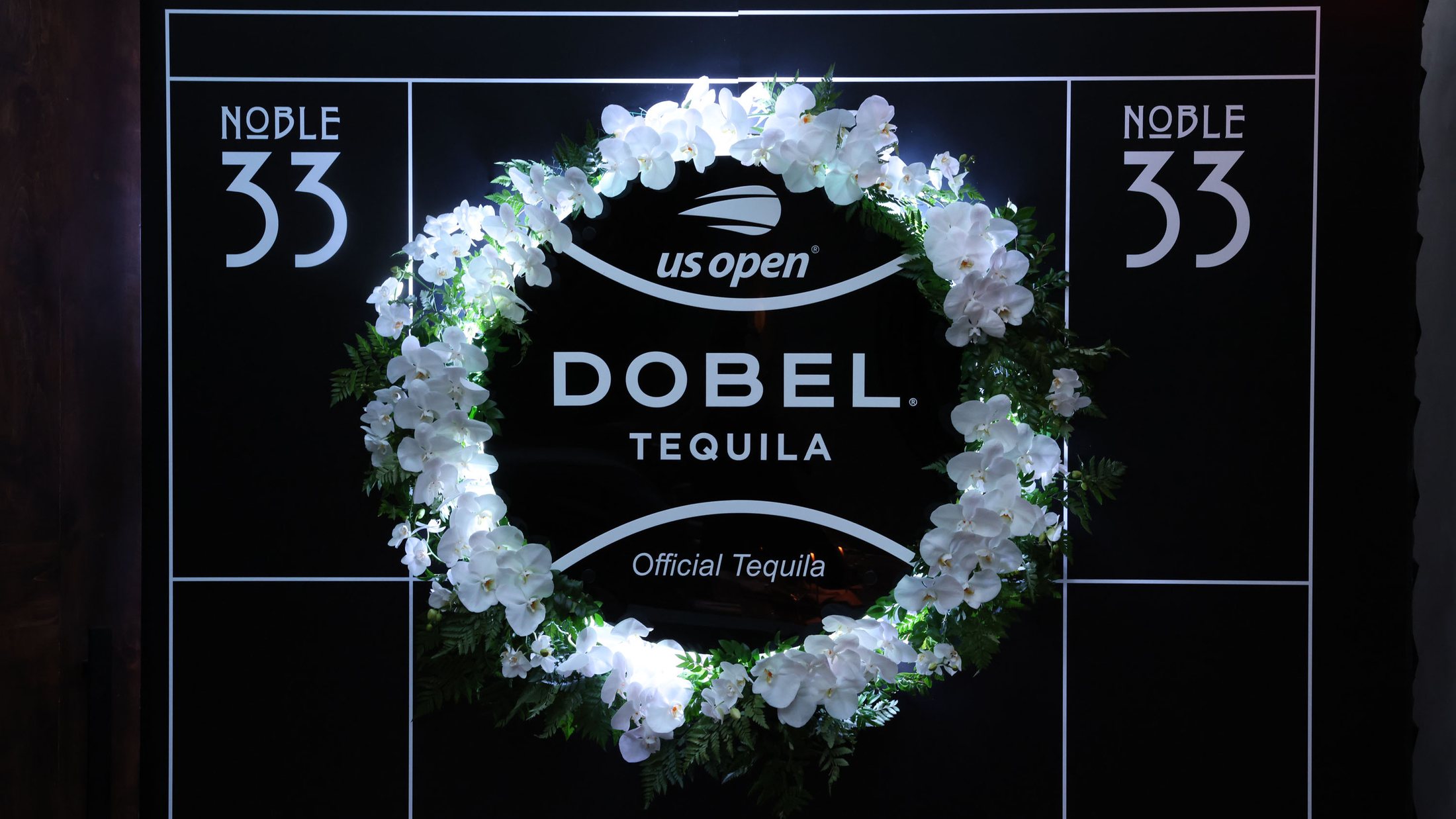 The Dobel Tequila x US Open x Noble 33 step-and-repeat at Mēdüzā Mediterrania